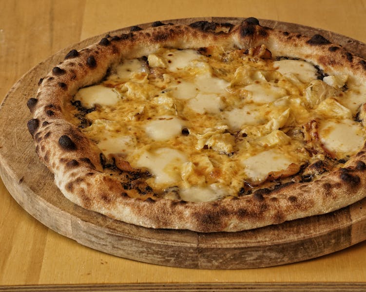 Four Cheese pizza with gorgonzola, fontina, mozzarella and parmesan