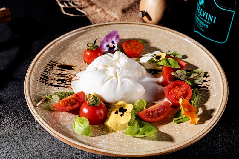 Burrata bruschetta with heirloom tomatoes on sourdough