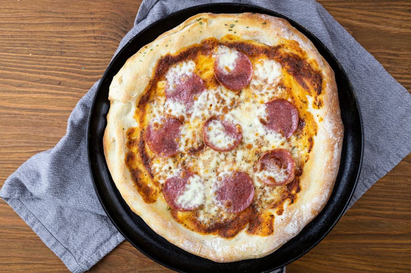 Spicy Diavola pizza with salami and chili flakes